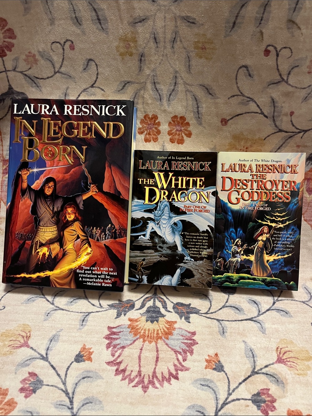 In Legend Born Trilogy by Laura Resnick